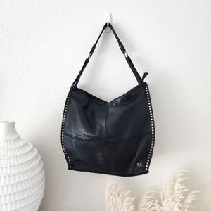 The Sak silver studded black leather hobo bag